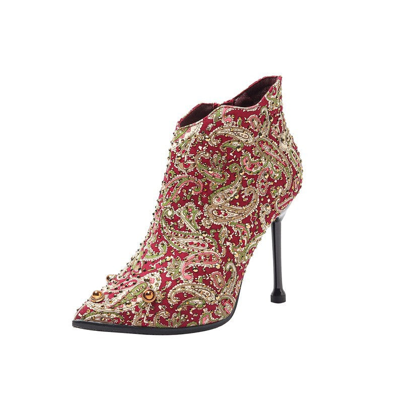 Damenstiefel mit spitzer Zehenpartie und Stilettoabsatz und Blumen-Strass